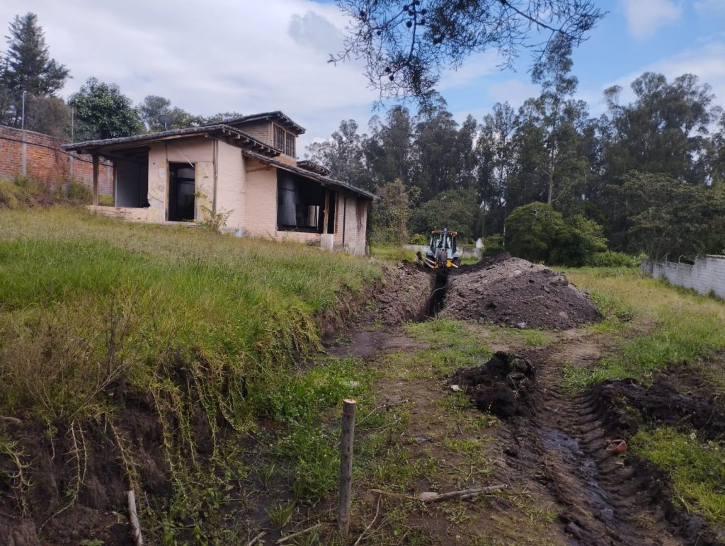 Vista inicial del terreno y entorno antes de la lotización del proyecto terminado Jardines Ushimana.